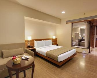 Temple Tree Hotel Shirdi - שירדי - חדר שינה