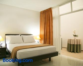 Hotel Casimena - El Yopal - Camera da letto