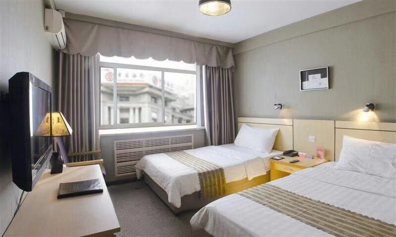 Yuanda Business Hotel - هاربين - غرفة نوم