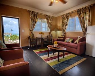 Experience tranquil, secluded and elegant seaside villas at Rollezz - Old Bight - Living room