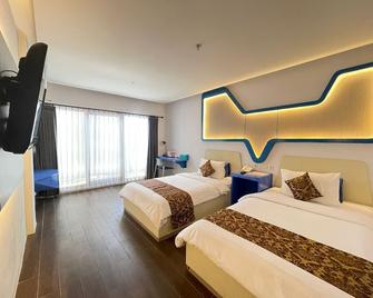 Golden Palace Hotel - Ambon - Schlafzimmer