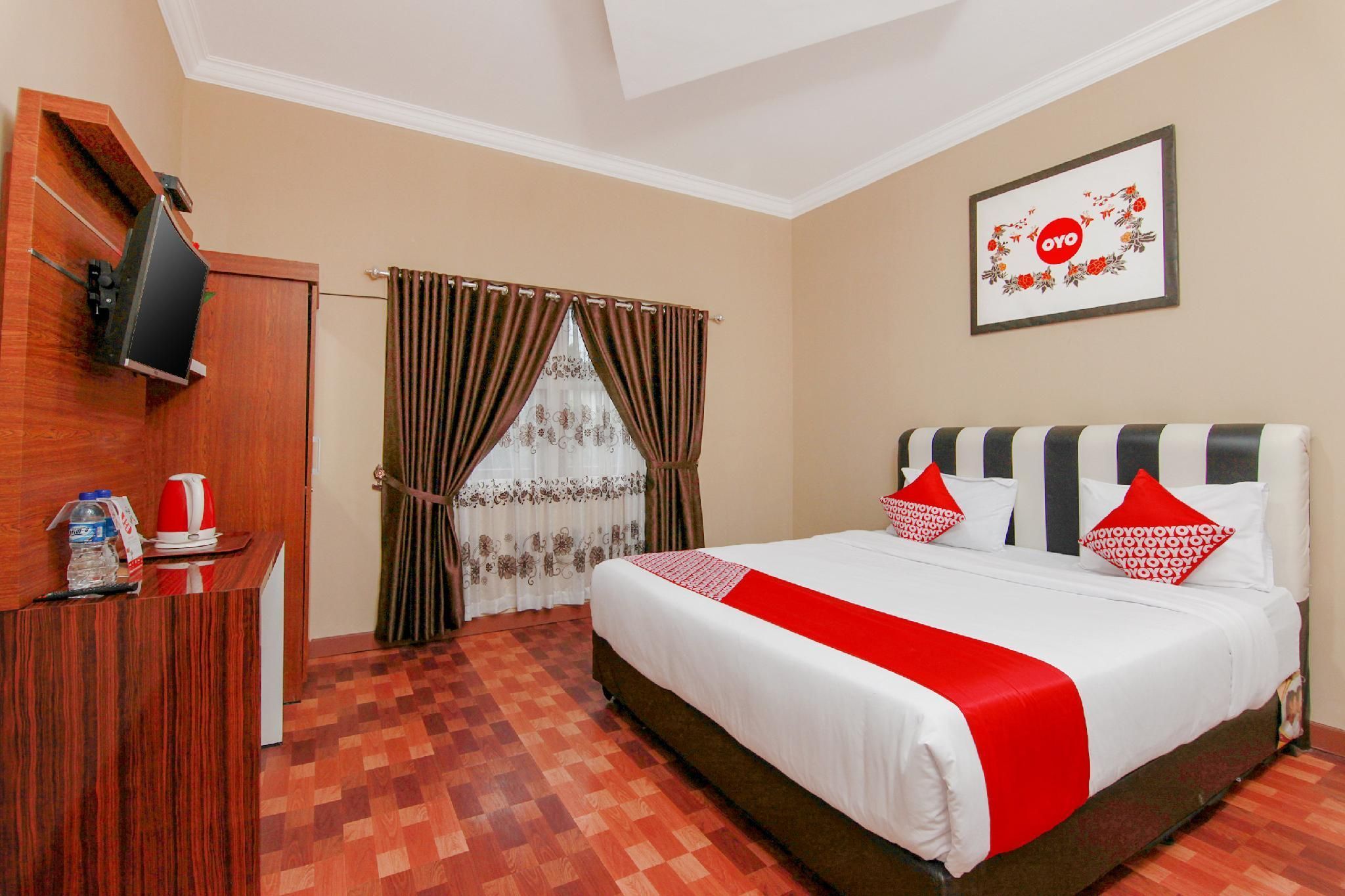 OYO 799 Hotel Dieng - Berastagi - Schlafzimmer