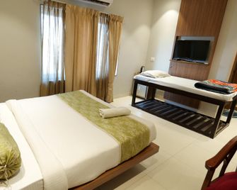Hotel Galaxy Inn - 哥打 - 臥室