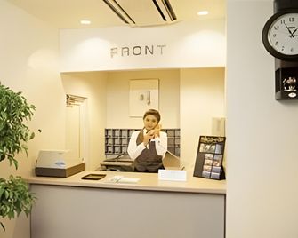 Hirosaki Ekimae Hotel - Hirosaki - Front desk