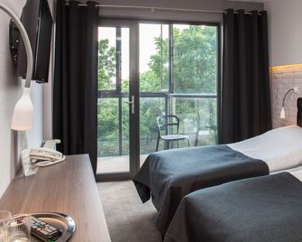 Hotel Czarna Roza - טורון - חדר שינה