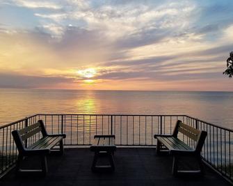 Private Beach - Waterfront home with picture windows, large deck & amazing views - Port Austin - Balcony