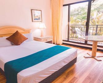 SureStay Hotel by Best Western Guam Airport South - Barrigada - Bedroom