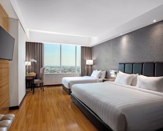 The Alana Hotel & Convention Center Solo By Aston - סורקטה - חדר שינה