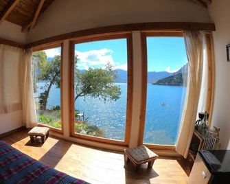 Exclusive lakefront cabin with luxury outdoor shower - San Marcos La Laguna - Habitación
