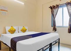 OYO Flagship 808502 Delightful Residency - باجا (الهند) - غرفة نوم