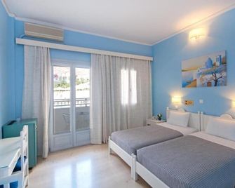 Glaros Hotel - Kamari - Makuuhuone