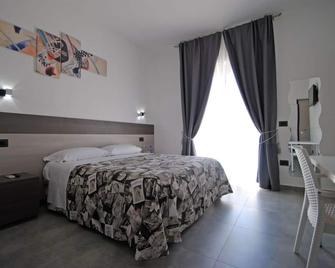 Novo Motel - Montone - Habitación