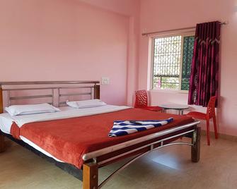 Krishna Tara Comforts - Araku Valley - Bedroom