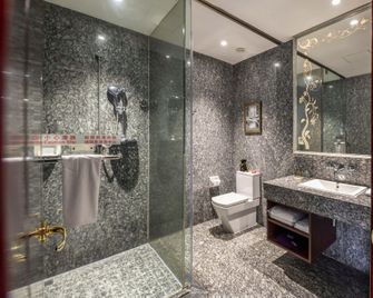 Tegoo Hotel - שיאמן - חדר שינה