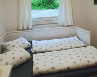 Gemütliche Wohnung 10 Minuten vom See entfernt - Zell am See - Slaapkamer