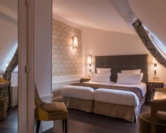 فندق Crystal - باريس - غرفة نوم