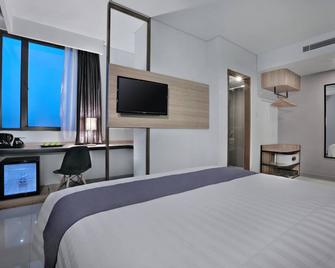 Hotel Neo Gajah Mada Pontianak By Aston - Pontianak - Bedroom