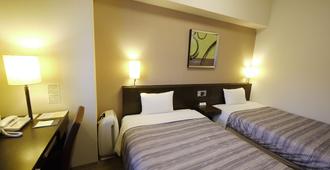 Hotel Route-Inn Chitose Ekimae - Chitose - Phòng ngủ