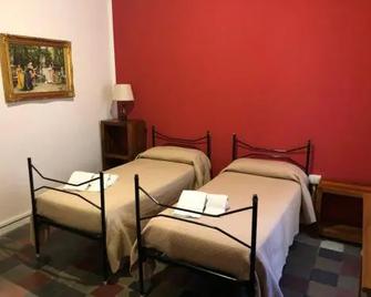 Bed and Breakfast Family Palazzo Stillitano Stilo - Stilo - Habitación