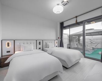 Andong Win Hotel - Andong - Bedroom