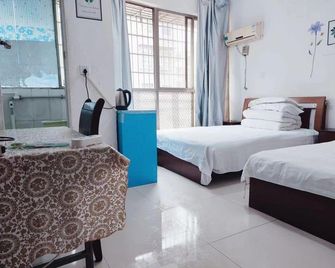 Changsha Weiwei Guest House - Changsha - Habitación