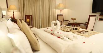Hotel Republic - Patna - Slaapkamer