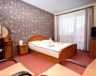 Villa Centrum Mlodosci - Augustow - Camera da letto