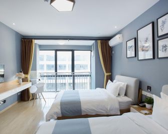 Hui Serviced Apartment (Suzhou Xiangcheng Huangdai) - Suzhou - Bedroom