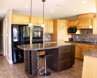 Premium Vacation - Vernon - Cuisine