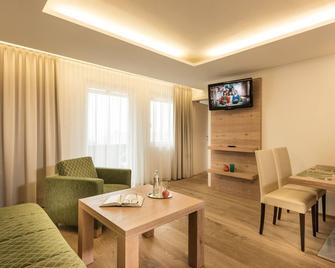 Aurora Appartements inklusive freiem Thermeneintritt - Bad Hofgastein - Wohnzimmer