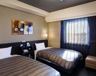 Hotel Route-Inn Nihonmatsu -Kokudo 4Gou- - Nihonmatsu - Slaapkamer