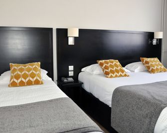 Hôtel Des Quatrans - קאה - חדר שינה