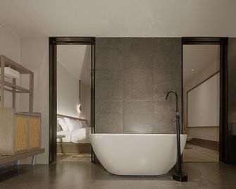 Nice Boyue Hotel (Jiaojiang Taizhouwan Hongjin Life Plaza) - Taizhou - Schlafzimmer