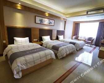 Light Stay Yuexiang Hotel (Maoming High-speed Railway Station North Square) - Maoming - Habitación