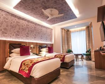 Hotel Rj - Managed By Ahg - Greater Noida - Bedroom