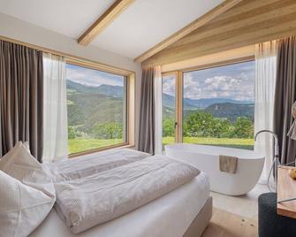 Oberplunerhof Luxury Chalet Woods - Chienes/Kiens - Slaapkamer