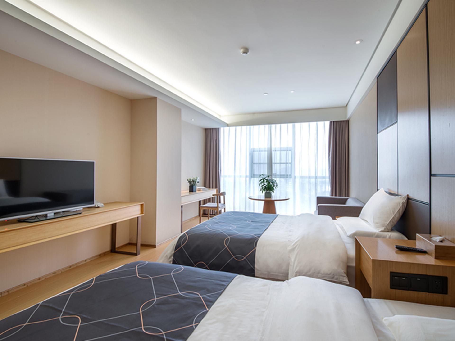 Chonpines Hotels·Leshan Giant Buddha - Leshan - Camera da letto