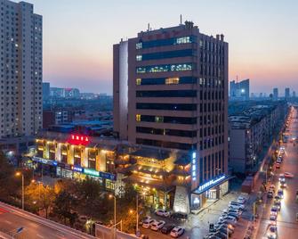 Baoyang Boutique Hotel (Shijiazhuang North Zhonghua Street Zhongchu Plaza) - Shijiazhuang - Edificio
