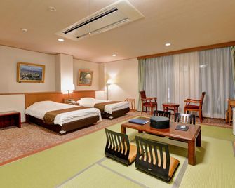 Kotoyuu Hotel - Ōtsu - Schlafzimmer