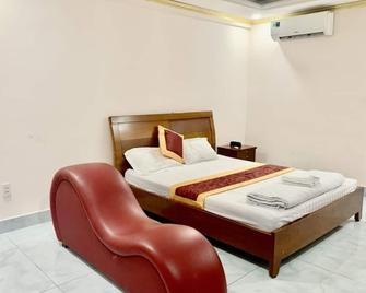 OYO 1170 Nhan Duc Hotel - Hồ Chí Minh - Phòng ngủ