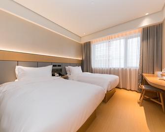 Ji Hotel Shanghai Xujiahui Branch - שנחאי - חדר שינה