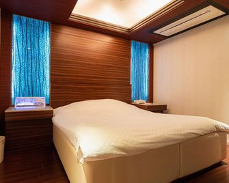 Hotel Tiki - Tokushima - Schlafzimmer