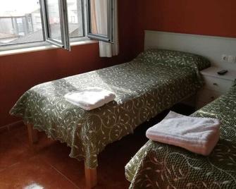 O Encontro - Fisterra - Camera da letto