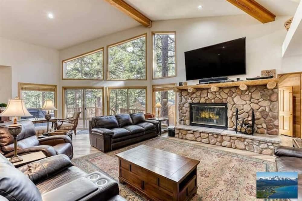 Living room view of 6000sf Pine House with indoor swimming pool