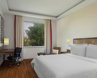 فور بوينتس باي شيراتون نيودلهي೮ - نيو دلهي - غرفة نوم