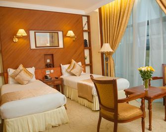 Palace Hotel Arusha - Arusha - Slaapkamer