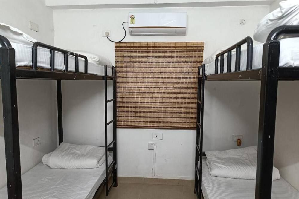 Travelers Hostel - גוואטי - חדר שינה