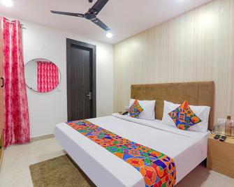 Fabhotel The Comfort - Prayagraj - Bedroom