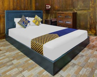 OYO 92083 Lailik Gilang Guesthouse - Pacitan - Habitación