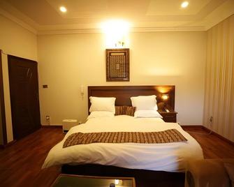 The Host Guest House - Islamabad - Habitación